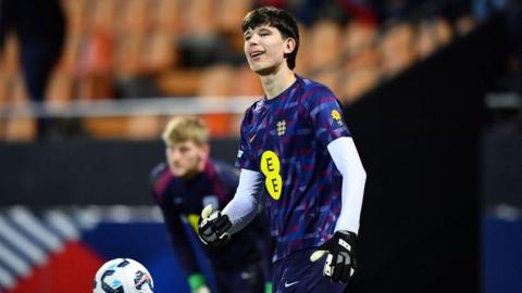 James Beadle warms up prior to an England U21 international match