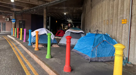 Three tents at a city centre car park
