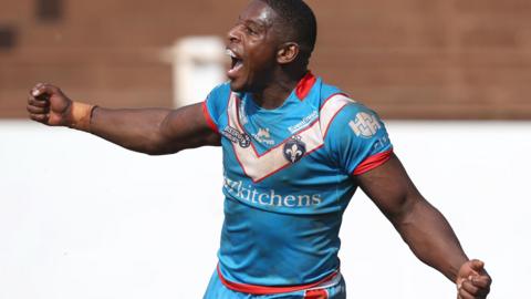 Jermaine McGillvary celebrates a try for Wakefield Trinity