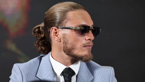 Jack Rafferty looks on at a press conference for his fight 