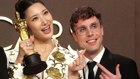 Golden songwriters Ejae and Mark Sonnenblick winners of the Best Original Song for "Golden" from “KPop Demon Hunters" pose in the press room during the 98th Oscars at Dolby Theatre.