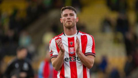 Jordan Thompson applauds after playing a match for Stoke City