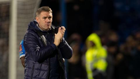 Stockport County boss Dave Challinor applauds their fans