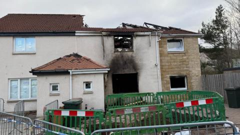 A house damaged by fire in Niddrie, Edinburgh