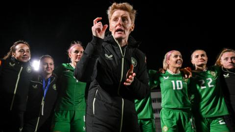 Eileen Gleeson speaks to her team after the 6-0 victory