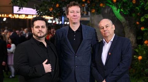 From left: James Lamont, Jon Foster and Mark Burton attend the Paddington In Peru premiere