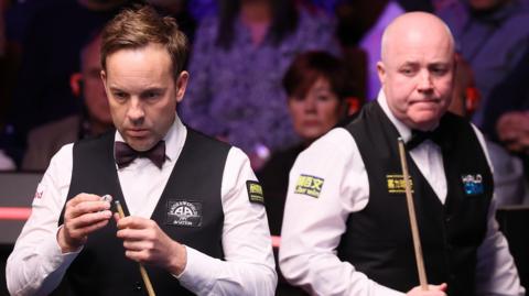 Ali Carter and John Higgins