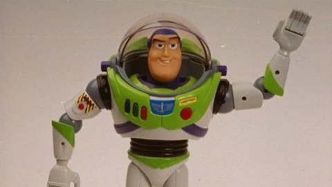 Figurine of Buzz Lightyear from Toy Story saluting