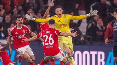 Benfica goalkeeper Anatoliy Trubin celebrates scoring a late winner against Real Madrid in the Champions League