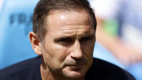 A headshot of Frank Lampard watching Coventry v Hull while sat in the dugout