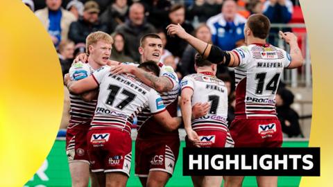Wigan Warriors players celebrate
