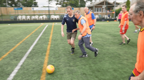 Men playing football