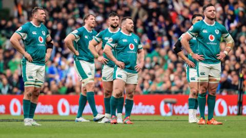 Ireland players standing dejected