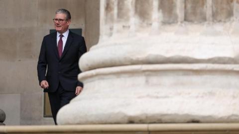 British Prime Minister Keir Starmer leaves after a reception at the British Museum