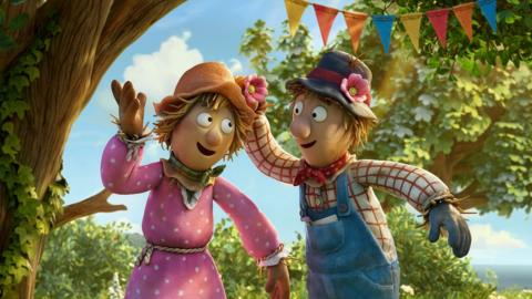 two scarecrows dancing