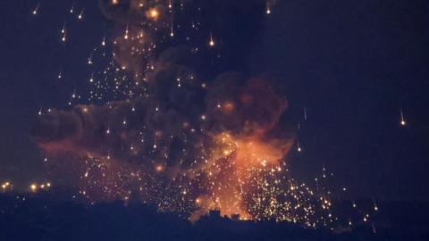 Smoke and flames rise in Beirut's southern suburbs, after Israeli air strikes, amid ongoing hostilities between Hezbollah and Israeli forces, as seen from Sin El Fil, Lebanon, October 6, 2024.