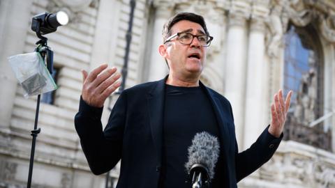 Andy Burnham speaks to the media outside the Methodist Central Hall on May 20, 2024 in London