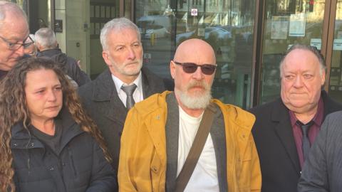 Image of Alison Young, Martin Whitehead, Nick Arlett and Lloyd Dunsford outside court