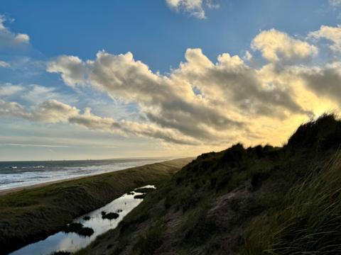Partly cloudy skies over the coast at Balmedie, Aberdeenshire