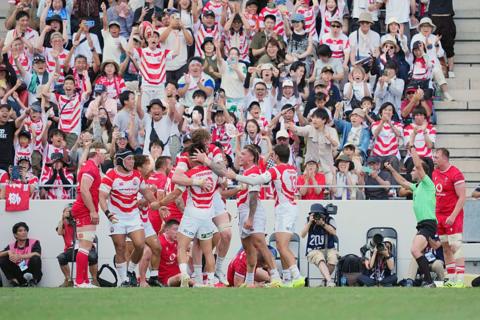 Japan celebrate their winning try