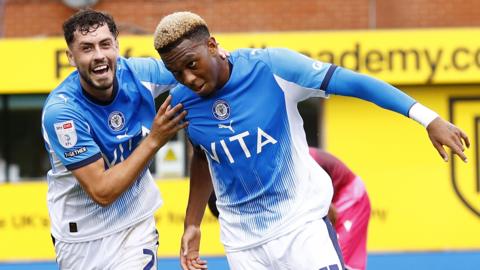 Malik Mothersille celebrates his goal for Stockport against Bolton
