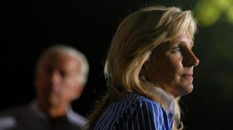 Joe Biden standing with his wife Jill in 2008