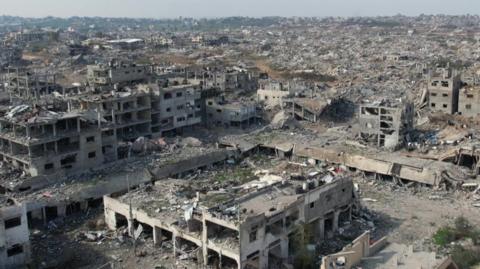 Aerial footage of destruction in Gaza, destroyed buildings as far as the horizon