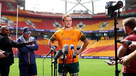 Australia captain Harry Wilson faces the media