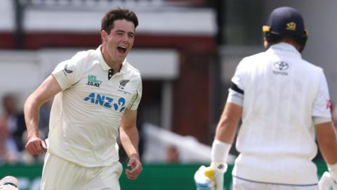 New Zealand fast bowler Will O'Rourke (left) celebrates taking the wicket of Englnad batter Joe Root (right)