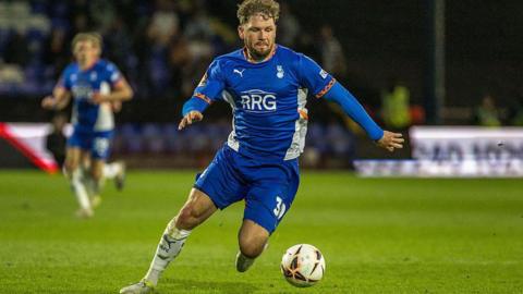 James Norwood in action for Oldham