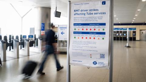 A sign in Paddington station, London, warning users of travel disruption on the Tube as London Underground drivers go on strike
