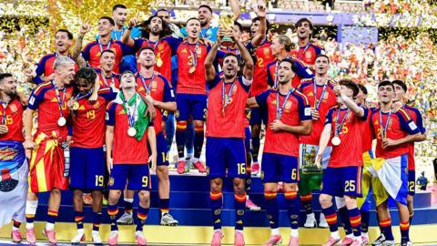 Spain lift the World Cup trophy