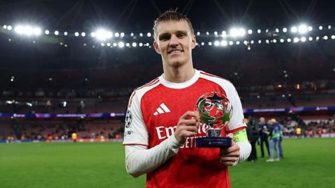 Martin Odegaard with his player of the match trophy