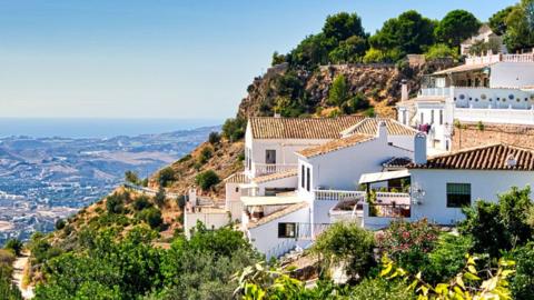 A scenic view of homes on a hilltop in Spain's Costa del Sol