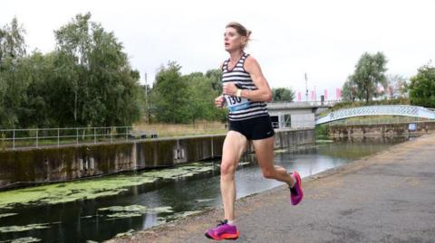 A competitor runs in a Couch to 5k event