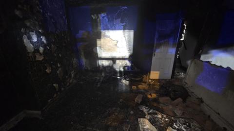 A badly burned room inside the property where the fire took hold