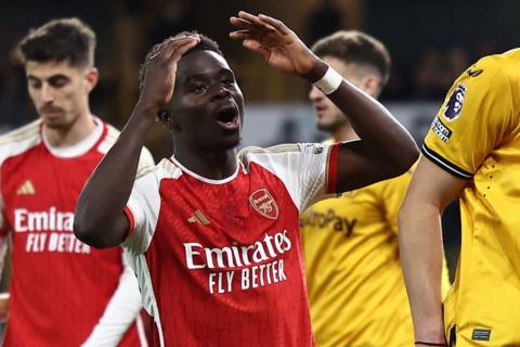 Arsenal's English midfielder Bukayo Saka reacts after missing a chance during the English Premier League football match between Wolverhampton Wanderers and Arsenal