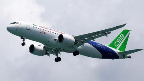 A Commercial Aircraft Corp of China Ltd. (Comac) C919 aircraft performs during a flying display at the Singapore Airshow in Singapore