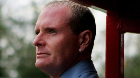 Paul Gascoigne in the dugout at Kettering Town's former Rockingham Road ground