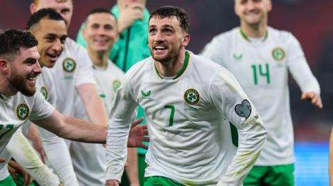 Troy Parrott celebrates with his Republic of Ireland team-mates