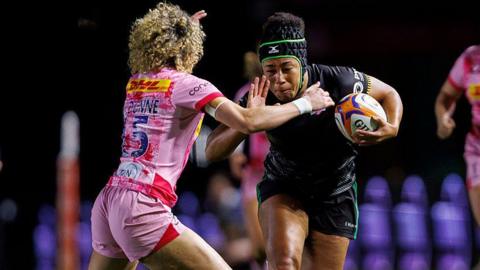 Ellie Kildunne of Harlequins attempts to tackle Sadia Kabeya of Loughborough Lightning