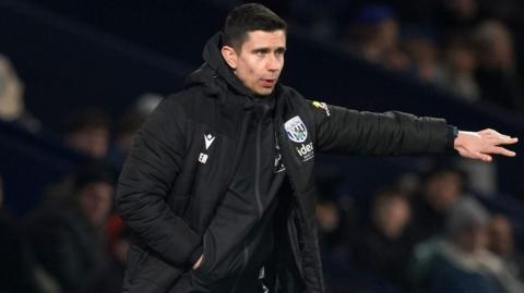 Ex-West Bromwich Albion head coach points his hand while on the touchline during his last game in charge in the 1-1 draw with Charlton