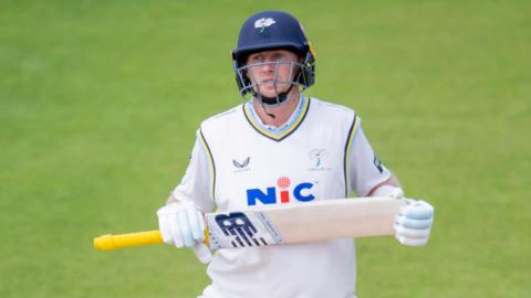 Joe Root walks out to bat for Yorkshire