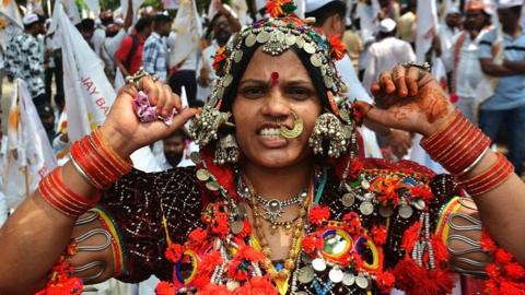 Members of the Banjara community from across Maharashtra gathered in Thane on Saturday to press their key demands implementation of the Hyderabad Gazette and inclusion of the community in the Scheduled Tribes (ST) category to secure reservation benefits, on October 4, 2025 in Mumbai, India. Thousands of community members participated in the morcha, raising slogans as they marched through major roads of the city before reaching the District Collector's office. The protesters urged the government to take an immediate and positive decision to ensure justice for the Banjara community. (Photo by Praful Gangurde/Hindustan Times via Getty Images)