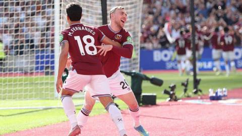 Jarrod Bowen and Mateus Fernandes celebrate during West Ham's win over Everton