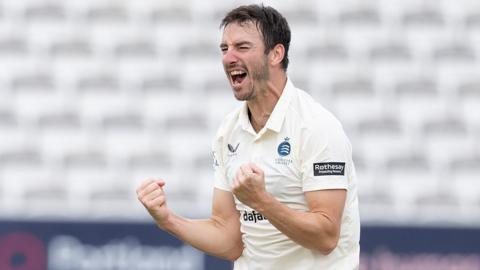 Toby Roland-Jones takes a wicket for Middlesex