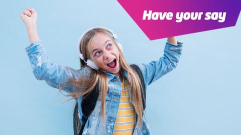 girl dancing with headphones on
