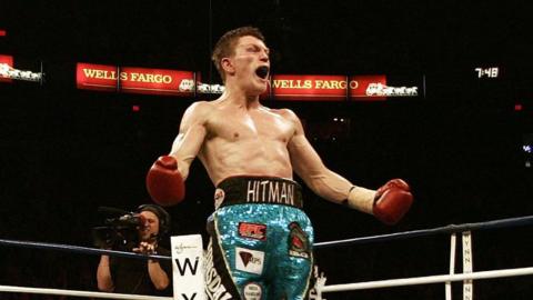 Ricky Hatton in boxing ring shouting with hands out either side