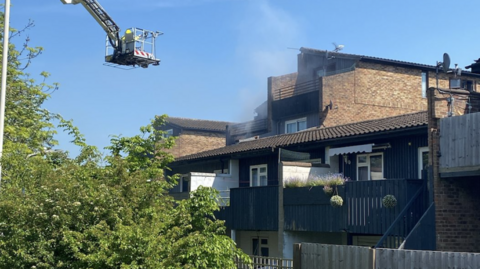 Firefighter on an aerial platform