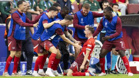 Switzerland's players celebrate going 2-0 up on Hungary